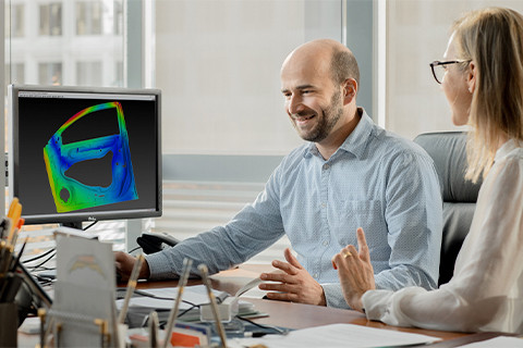 Engineers discussing BM-Stamp